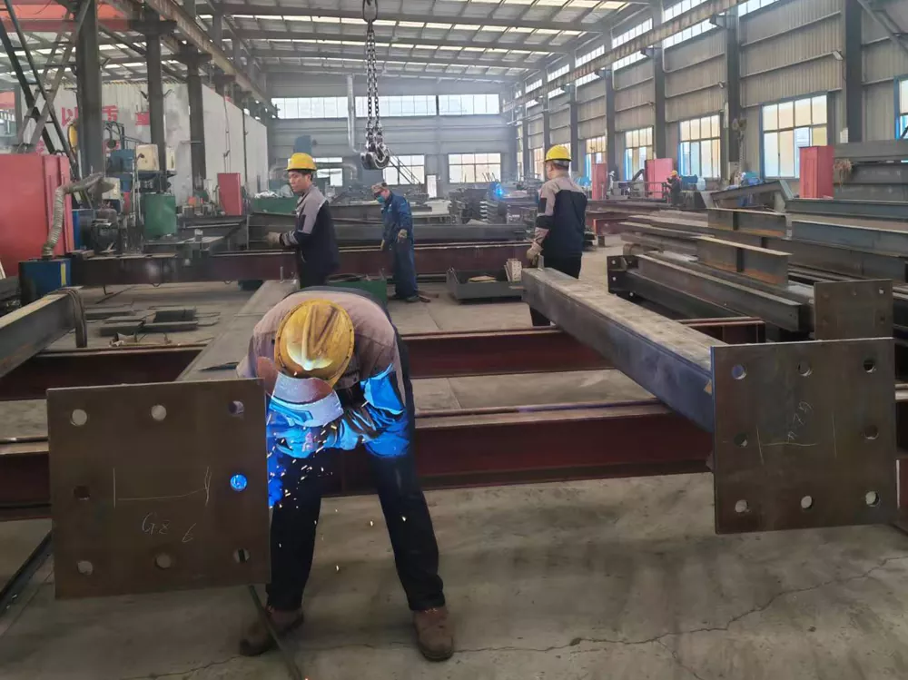 Quality inspector measuring welded steel component